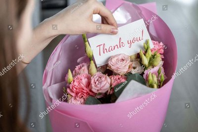 Soft coral bouquet in a gift vase