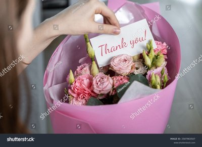 Soft coral bouquet in a gift vase