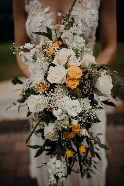 Wedding bouquet with blush roses and greenery